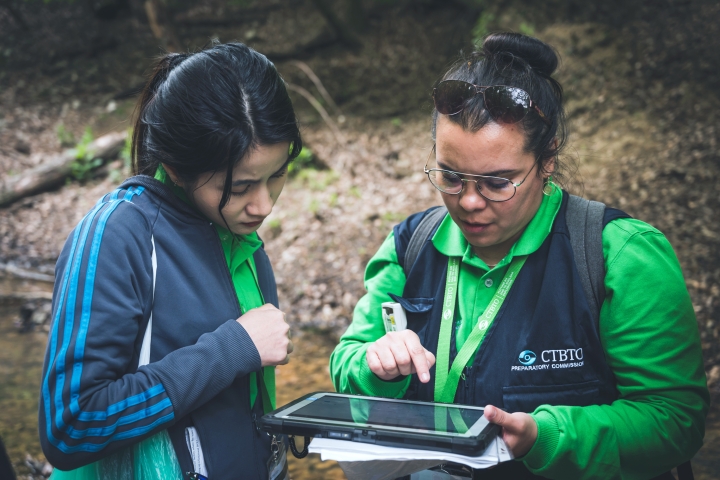 Field team members recording metadata during field missions using Geospatial Information Management for OSI (GIMO) application